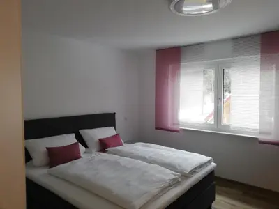 Ein Bett oder Betten in einem Zimmer der Unterkunft Fränkische Linie - Radspitz-Ferienwohnungen