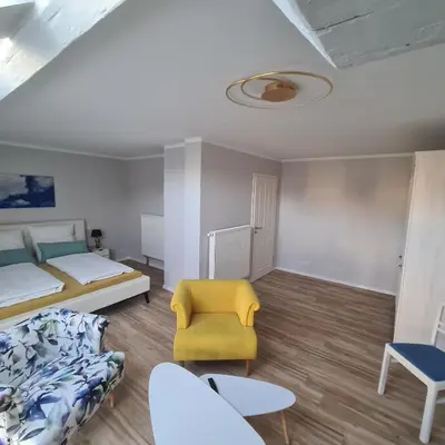 Ein Bett oder Betten in einem Zimmer der Unterkunft Gästezimmer Treuen - Bed & Breakfast
