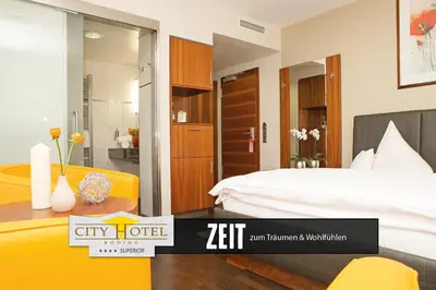 Ein Bett oder Betten in einem Zimmer der Unterkunft City Hotel Roding