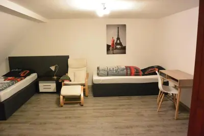 Ein Bett oder Betten in einem Zimmer der Unterkunft Ferienwohnung 