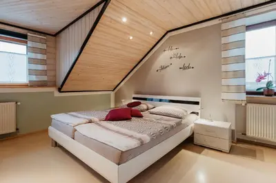 Ein Bett oder Betten in einem Zimmer der Unterkunft Ferienwohnung Reitinger
