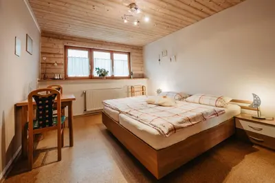 Ein Bett oder Betten in einem Zimmer der Unterkunft Ferienwohnung Reitinger