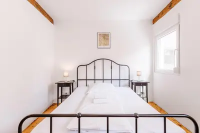 Ein Bett oder Betten in einem Zimmer der Unterkunft Am Weissen Turm