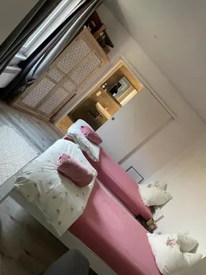 Ein Bett oder Betten in einem Zimmer der Unterkunft Ferienwohnung auf dem Land