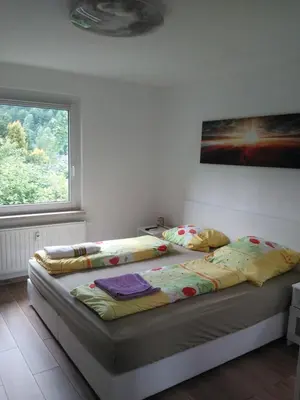 Ein Bett oder Betten in einem Zimmer der Unterkunft Alte Bäckerei Antonsthal