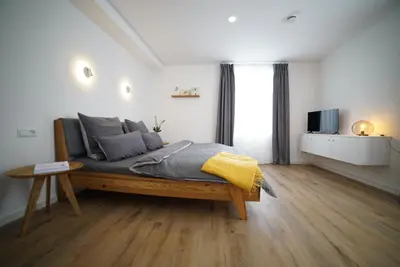 Ein Bett oder Betten in einem Zimmer der Unterkunft Villa Laas Oberwiesenthal