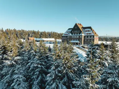 Naturhotel Sachsenbaude Oberwiesenthal - Indoor-Pool & Outdoor-Whirlpool im Winter