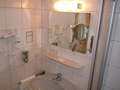 Ein Badezimmer in der Unterkunft Hotel Lugerhof