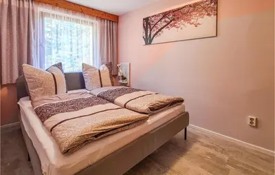 Ein Bett oder Betten in einem Zimmer der Unterkunft Beautiful Home In Adorfot Leubetha
