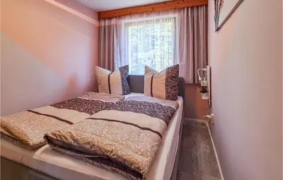 Ein Bett oder Betten in einem Zimmer der Unterkunft Beautiful Home In Adorfot Leubetha