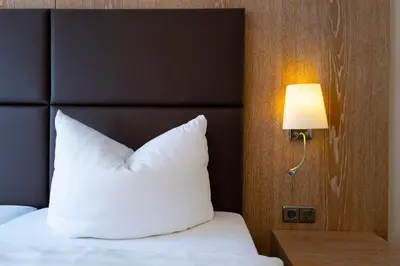Ein Bett oder Betten in einem Zimmer der Unterkunft Hotel & Apartments Böhm