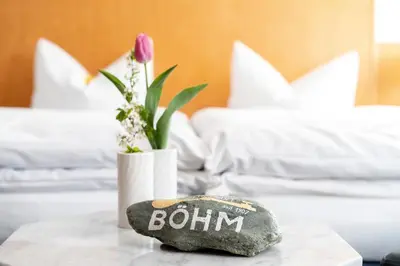 Ein Bett oder Betten in einem Zimmer der Unterkunft Hotel & Apartments Böhm