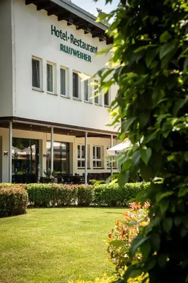 Ein Garten an der Unterkunft Hotel Russweiher