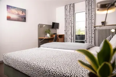 Ein Bett oder Betten in einem Zimmer der Unterkunft Hotel Russweiher
