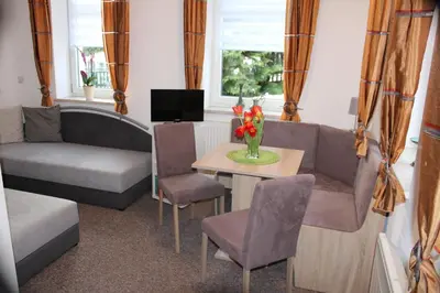 Ein Sitzbereich in der Unterkunft Ferienwohnung am Mühlbach