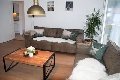 Ein Sitzbereich in der Unterkunft Ferienwohnung Seenglück