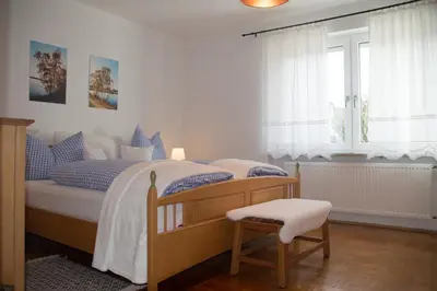 Ein Bett oder Betten in einem Zimmer der Unterkunft Ferienwohnung Seenglück