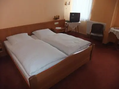 Ein Bett oder Betten in einem Zimmer der Unterkunft Gasthof Rotes Roß