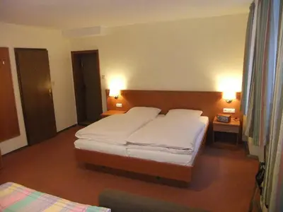 Ein Bett oder Betten in einem Zimmer der Unterkunft Gasthof Rotes Roß