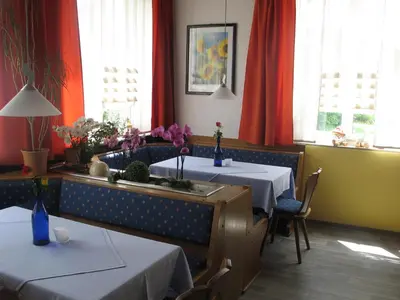 Ein Sitzbereich in der Unterkunft Gasthof-Pension Leupold