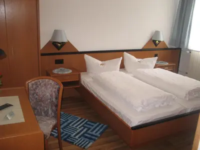 Ein Bett oder Betten in einem Zimmer der Unterkunft Gasthof-Pension Leupold