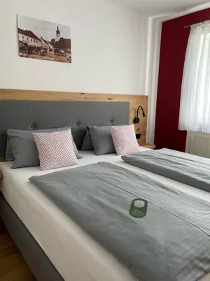 Ein Bett oder Betten in einem Zimmer der Unterkunft Hotel Weisses Ross