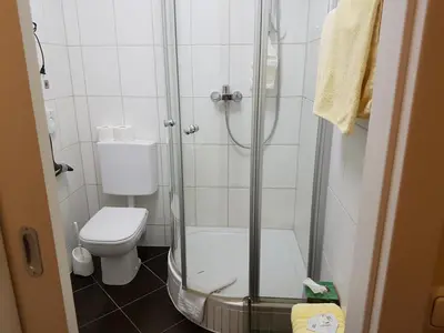 Ein Badezimmer in der Unterkunft Hotel Am Kuhbogen