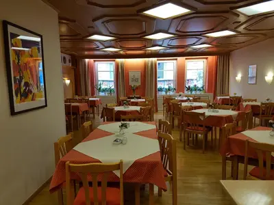 Ein Restaurant oder anderes Speiselokal in der Unterkunft Hotel Am Kuhbogen