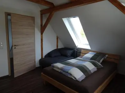 Ein Bett oder Betten in einem Zimmer der Unterkunft Fichtelhaisla