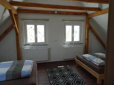Ein Bett oder Betten in einem Zimmer der Unterkunft Fichtelhaisla