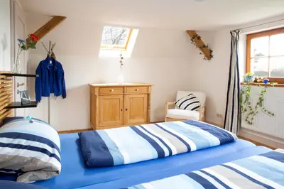 Ein Bett oder Betten in einem Zimmer der Unterkunft Ferienhaus Waldesruh
