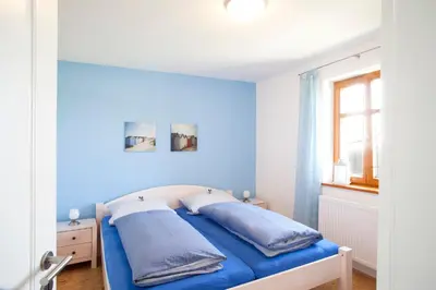 Ein Bett oder Betten in einem Zimmer der Unterkunft Das Landhaus