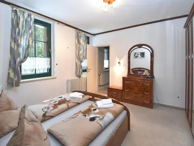 Ein Bett oder Betten in einem Zimmer der Unterkunft Luxurious Apartment in Jägersgrün with Saunas