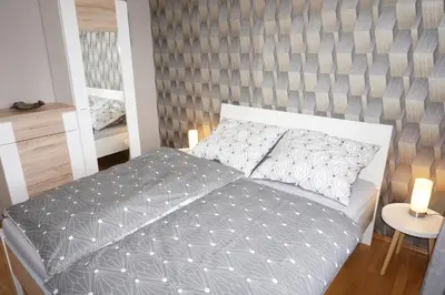 Ein Bett oder Betten in einem Zimmer der Unterkunft Weindl's Ferienwohnung