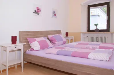 Ein Bett oder Betten in einem Zimmer der Unterkunft Ferienwohnung 