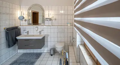 Ein Badezimmer in der Unterkunft Parkhotel Plauen
