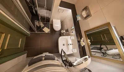 Ein Bett oder Betten in einem Zimmer der Unterkunft Parkhotel Plauen
