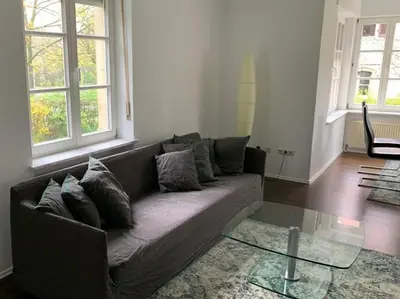 Ein Sitzbereich in der Unterkunft Apartment am Festspielpark