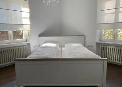 Ein Bett oder Betten in einem Zimmer der Unterkunft Apartment am Festspielpark