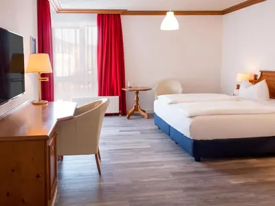 Ein Bett oder Betten in einem Zimmer der Unterkunft DORMERO Hotel Plauen