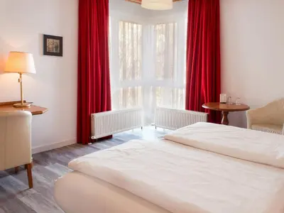 Ein Bett oder Betten in einem Zimmer der Unterkunft DORMERO Hotel Plauen