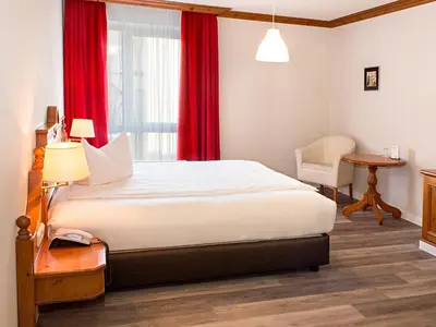 Ein Bett oder Betten in einem Zimmer der Unterkunft DORMERO Hotel Plauen