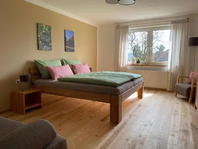 Ein Bett oder Betten in einem Zimmer der Unterkunft Naturspiel