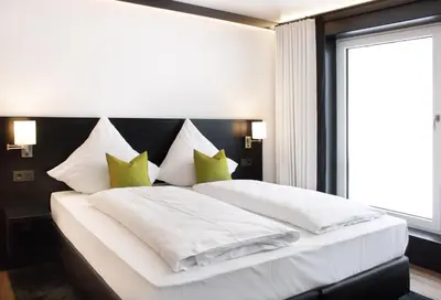 Ein Bett oder Betten in einem Zimmer der Unterkunft MAK Hotel by WMM Hotels