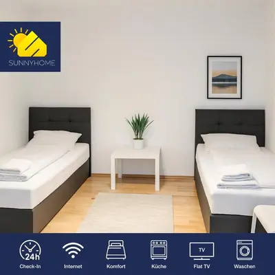 Ein Bett oder Betten in einem Zimmer der Unterkunft SUNNYHOME Monteurwohnungen und Apartments in Weiden