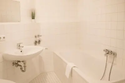 Ein Badezimmer in der Unterkunft SUNNYHOME Monteurwohnungen und Apartments in Weiden