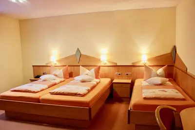 Ein Bett oder Betten in einem Zimmer der Unterkunft Zum Schwarzen Bären