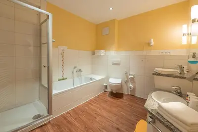 Ein Badezimmer in der Unterkunft Familotel Mein Krug