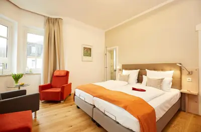 Ein Bett oder Betten in einem Zimmer der Unterkunft Villa Siegfried