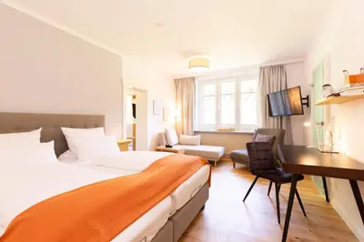 Ein Bett oder Betten in einem Zimmer der Unterkunft Villa Siegfried